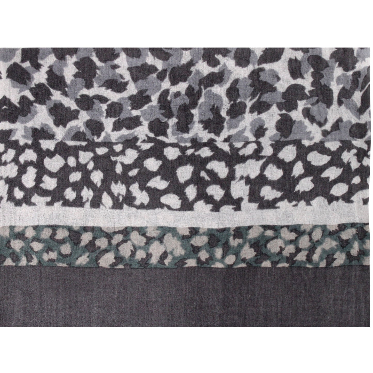 Close-up of soft gray wool cashmere fabric with leopard print texture